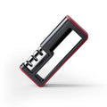Black and red three-stage manual knife sharpener with rubber feet on base