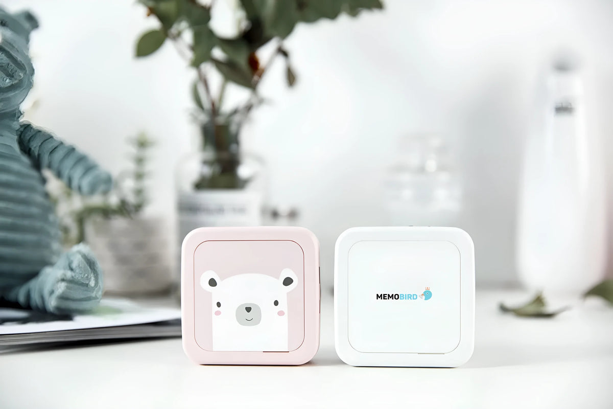 Thermal pocket portable Bluetooth printer in white, 79x79x40mm, with thermal paper roll inside