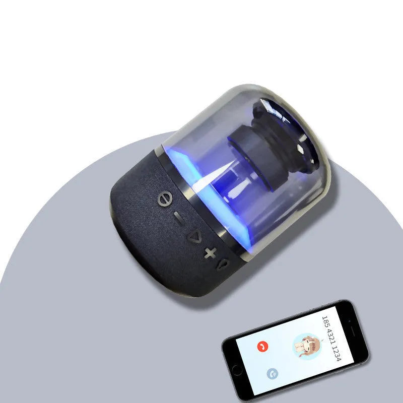 Four-colour light touch wireless Bluetooth speaker with control buttons and USB charging port.