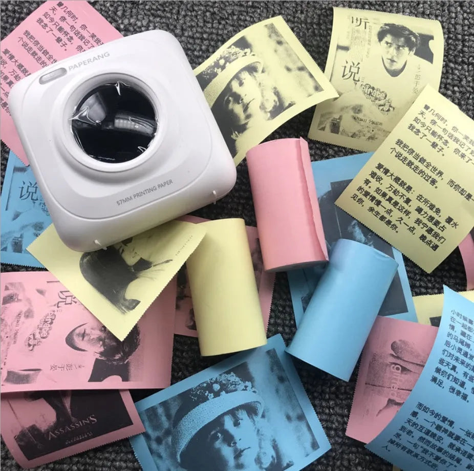 PerPage Mini wireless portable thermal printer paper rolls in regular, sticker and label styles, multiple colours