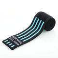 Weightlifting strength wristband in blue nylon with adjustable strap on gym floor