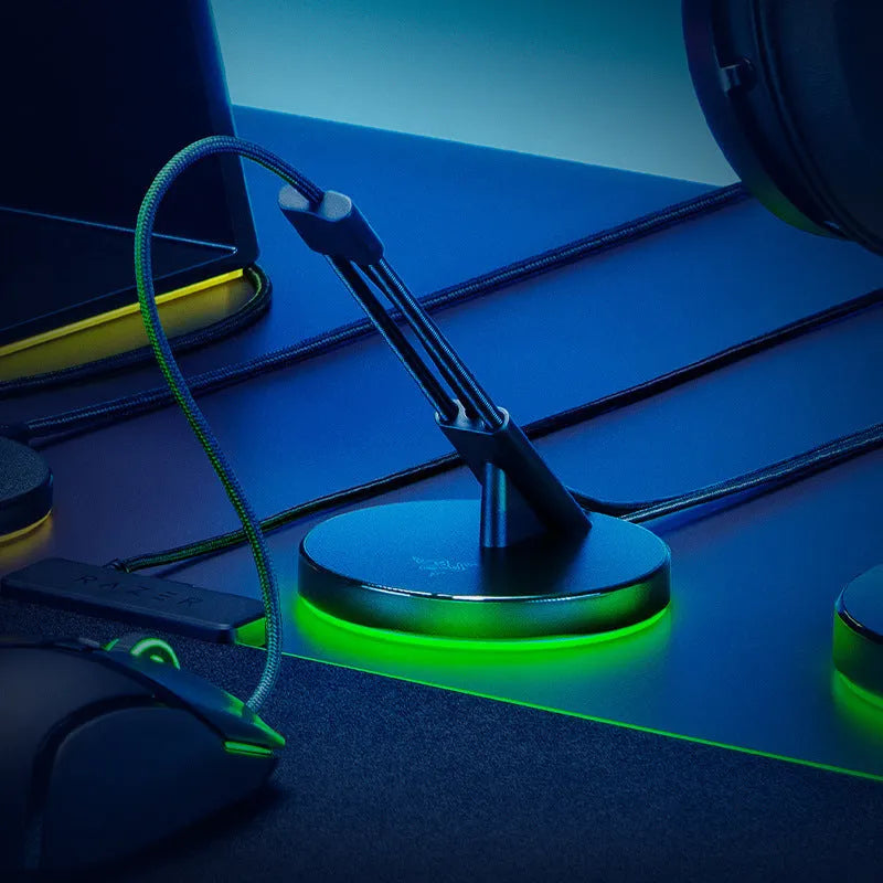 Thunder Snake V3 Magic Colour mouse cable fastener with RGB lighting on black desktop