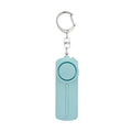 Girls personal safety alarm in pink colour showing compact size with activation button.