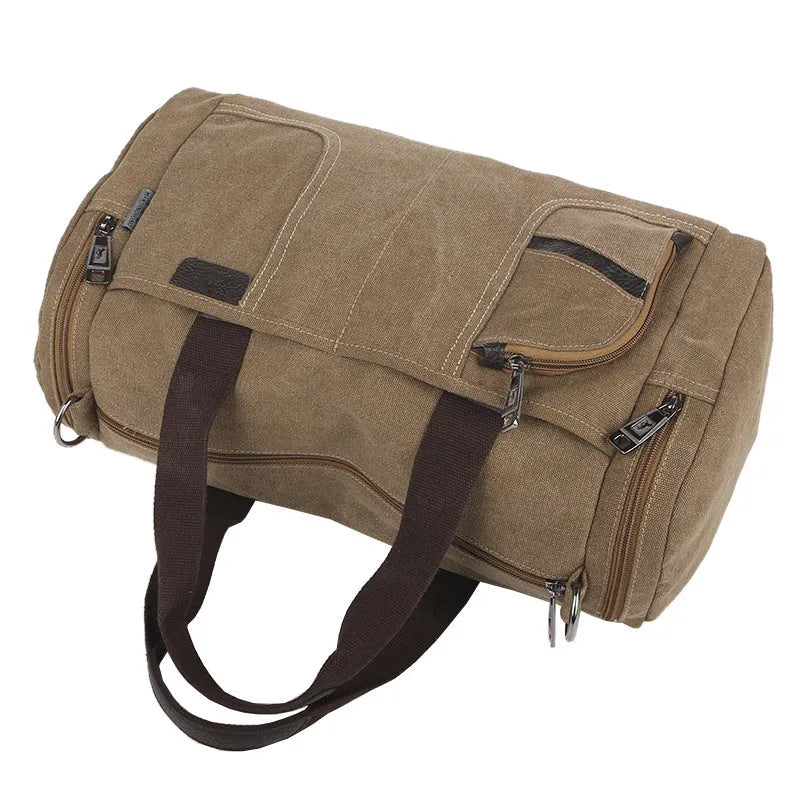 Horizontal square canvas shoulder bag with zipper closure and multiple pockets in khaki colour