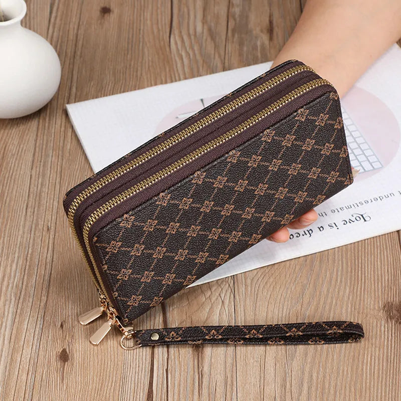 Long PU leather wallet clutch with zip closure and retro print decoration showing internal compartments
