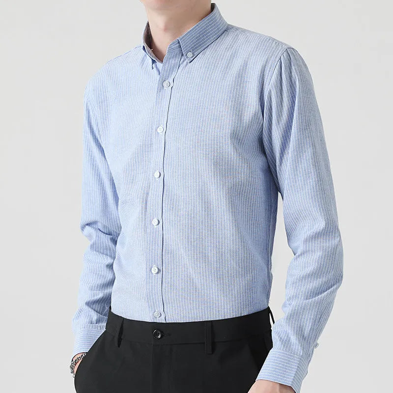 Casual men's long-sleeved cotton Oxford striped shirt in slim fit cardigan style, shown in blue