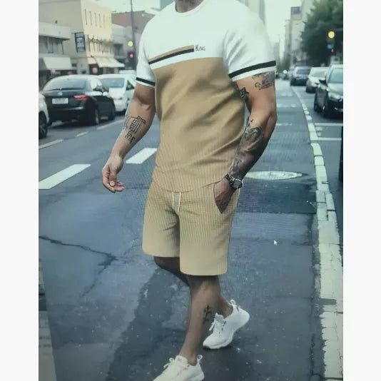 Men's loose-fit polyester short-sleeved t-shirt and matching shorts in a summer leisure suit.