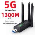 Black USB WiFi network transmitter dongle with four extended external antennas.