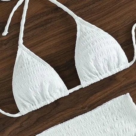 White lace-up split bikini swimsuit three-piece set with spandex fabric on woman at beach