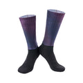 A pair of breathable cycling and running socks in an orange colour on a plain background.