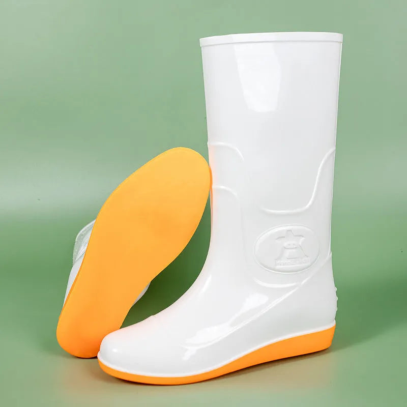 Men's white plastic high tube rain boots with a flat heel on a solid background.
