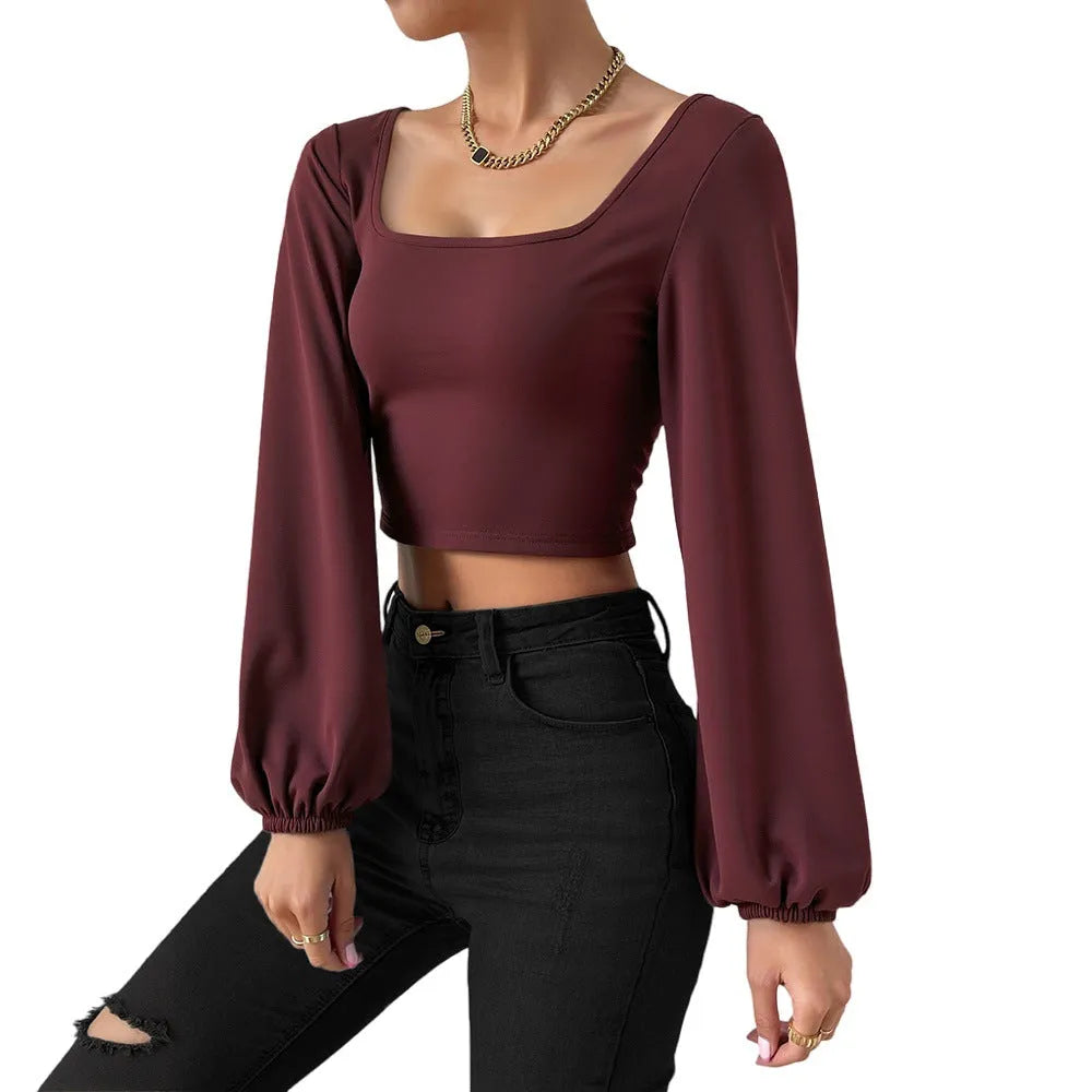Wine red long-sleeved slim fit shirt with retro lantern sleeves and collage patchwork detail on polyester fabric