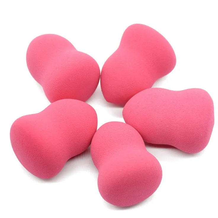 Pink makeup foundation sponge on white background showing 4cm width and 5.6cm height