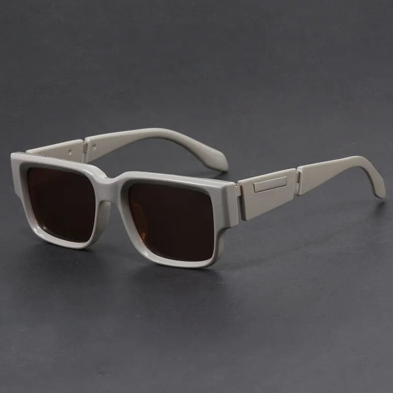 Gray blue square sunglasses with a thick retro frame and UV-protective lenses.