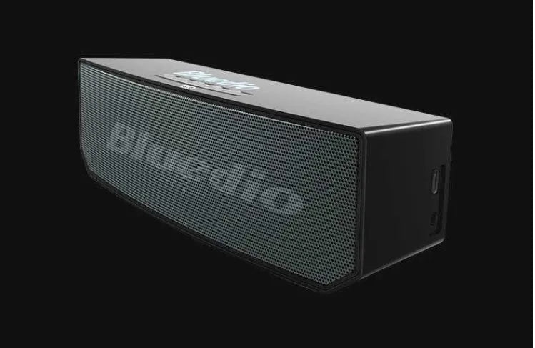 Black Bs-6 cloud smart speaker showing compact design with micro-USB port