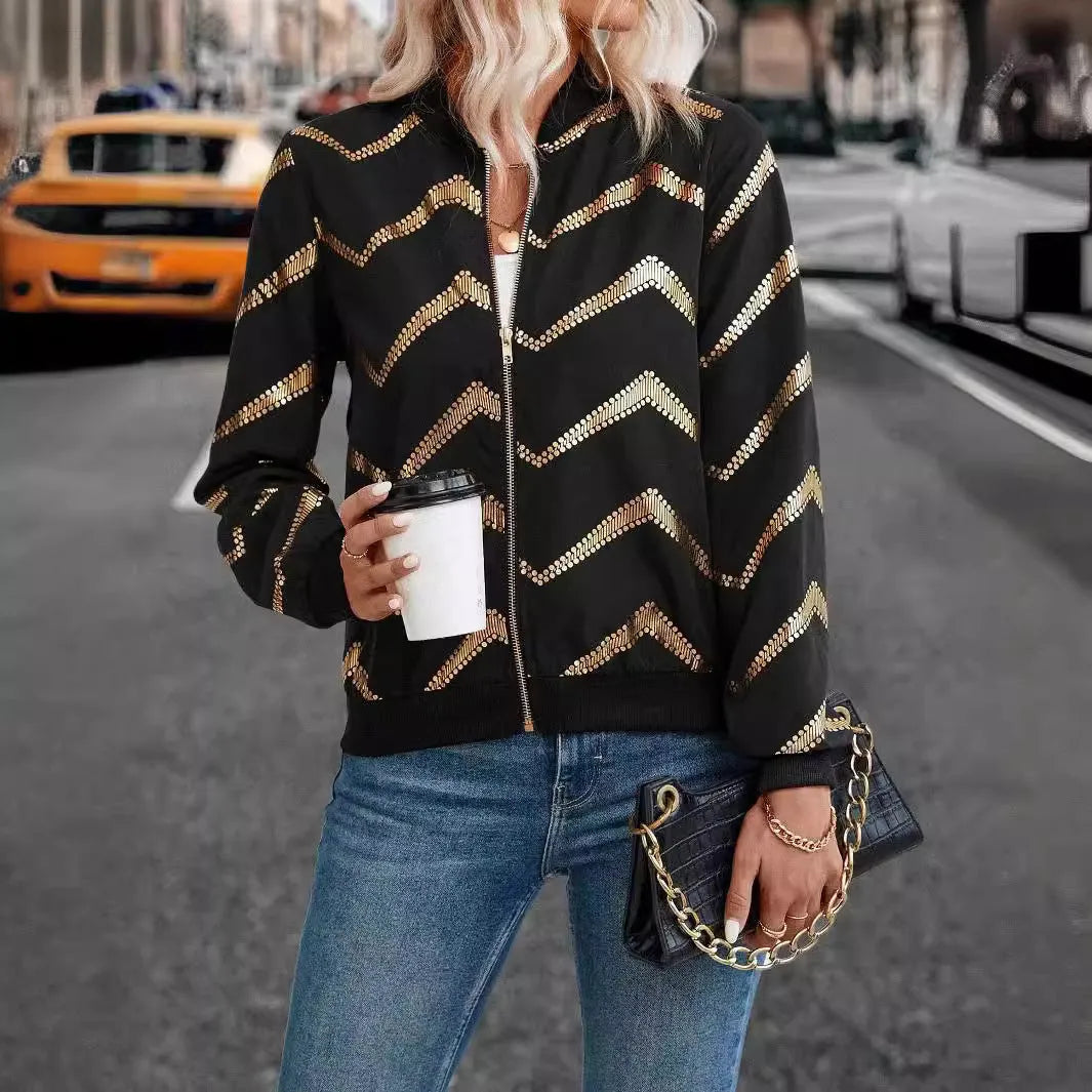 Women's black polyester spring jacket with gold zigzag print, conventional sleeves, shown on model