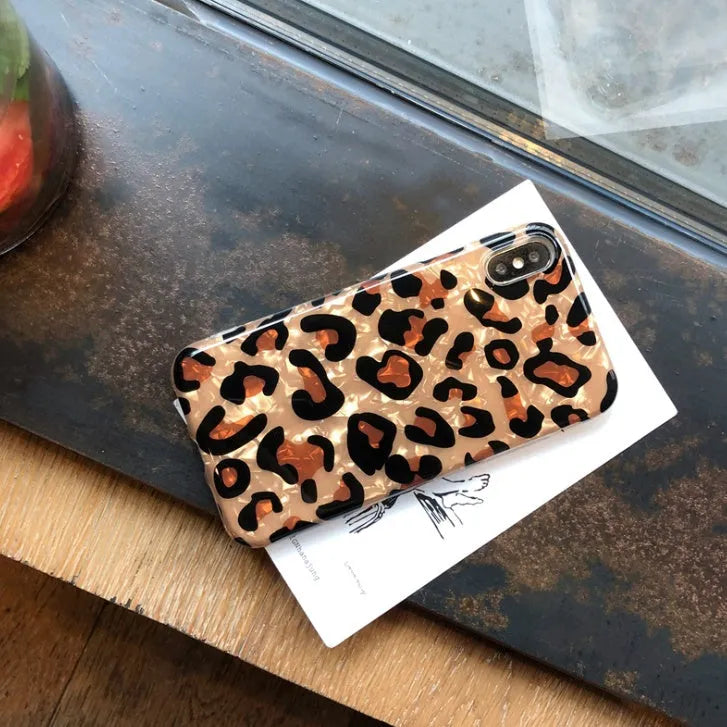 Colourful leopard print pattern on a black silicon and TPU iPhone case for XR or XS MAX.