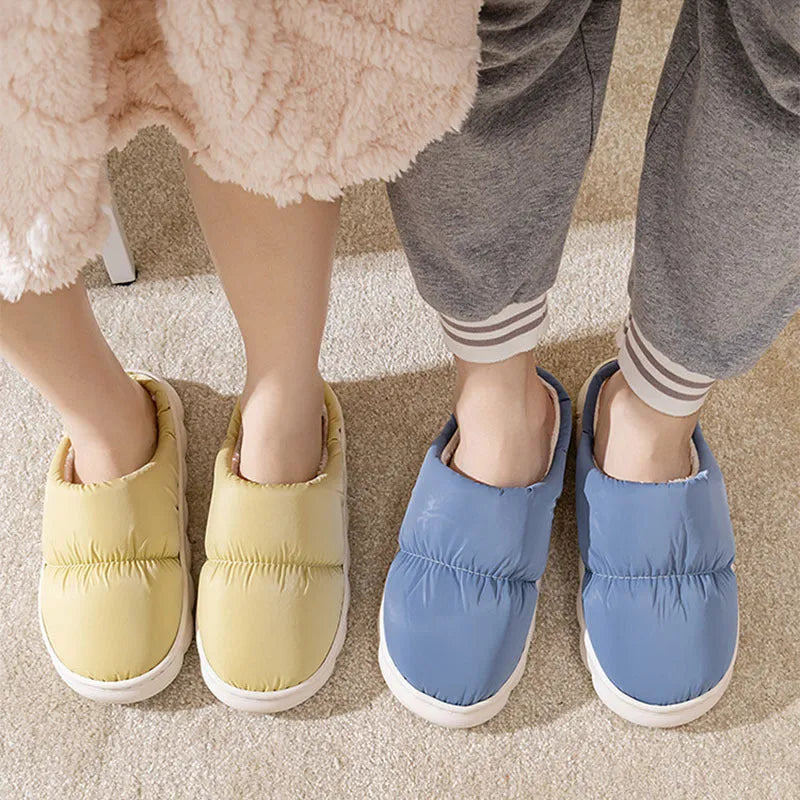 Blue thick-soled indoor slippers with artificial leather upper and plush lining on a rubber sole.