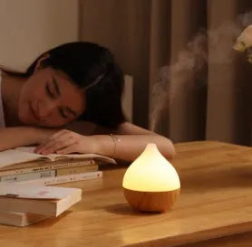 Asakusa wood grain finish vase-shaped 100ml USB aroma diffuser on a surface.