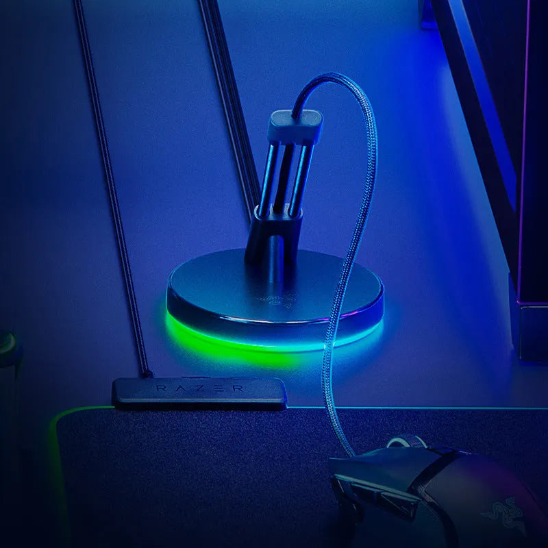 Thunder Snake V3 Magic Colour mouse cable fastener with RGB lighting on black desktop