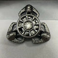 Flame Butterfly alloy metal rotating fingertip fidget gyro toy in colourful or space grey.