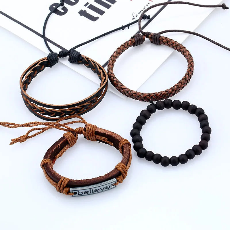 Believe Suit brown leather bracelet with geometric design on a men's wrist