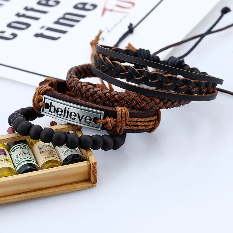 Believe Suit brown leather bracelet with geometric design on a men's wrist