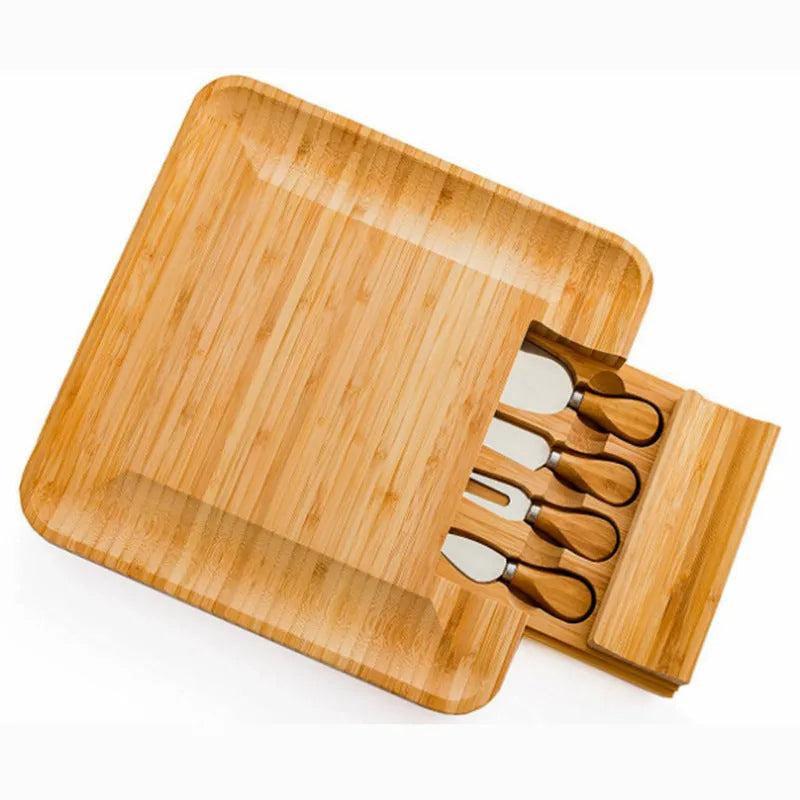 Square bamboo cutting board in wood colour with four knives and forks arranged on top