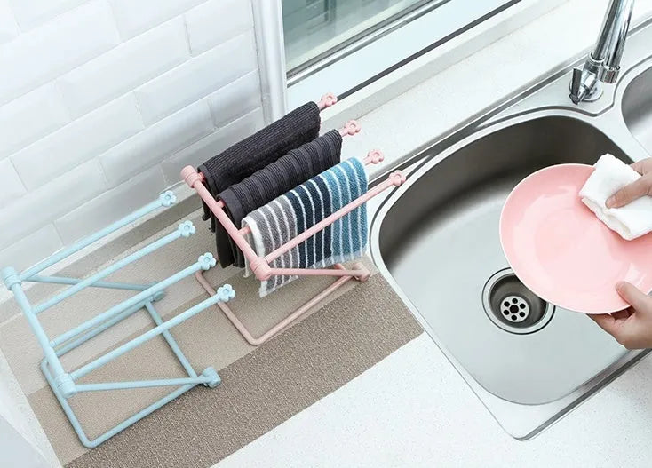 Foldable plastic dishcloth shelf in Nordic style colours with punch-free installation for kitchen organisation