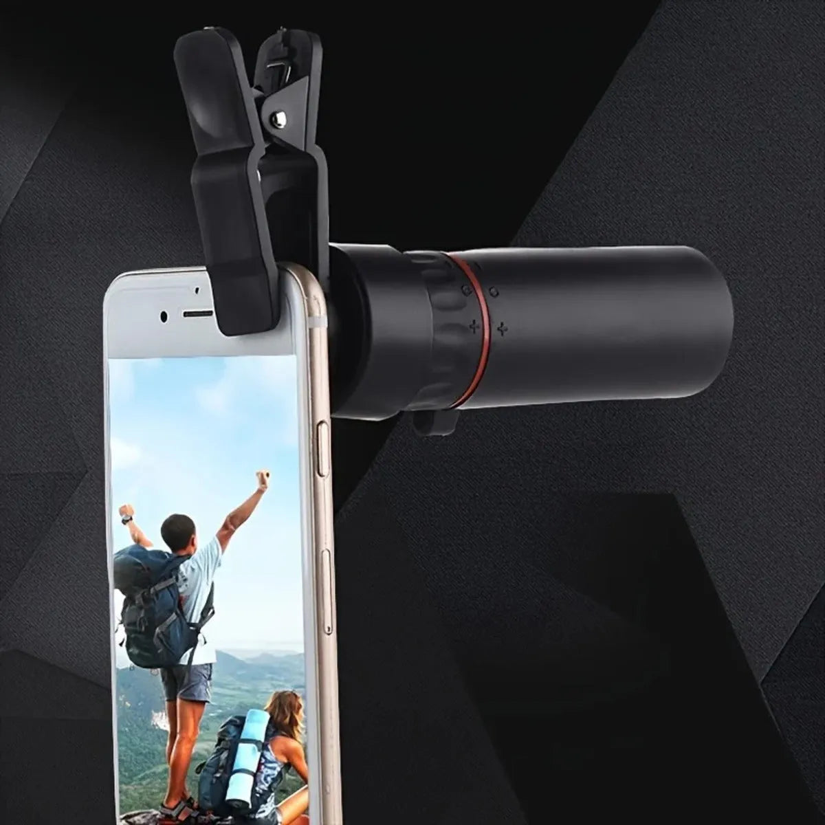 Black monocular telescope with rubber exterior and mobile phone attachment holder