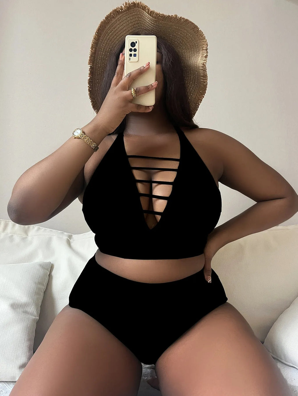 Plus size hollow cross halter bikini in black with adjustable straps and high waist briefs