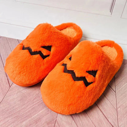 Cozy pumpkin-themed slippers with plush coral velvet upper and non-slip PVC sole for comfortable indoor wear