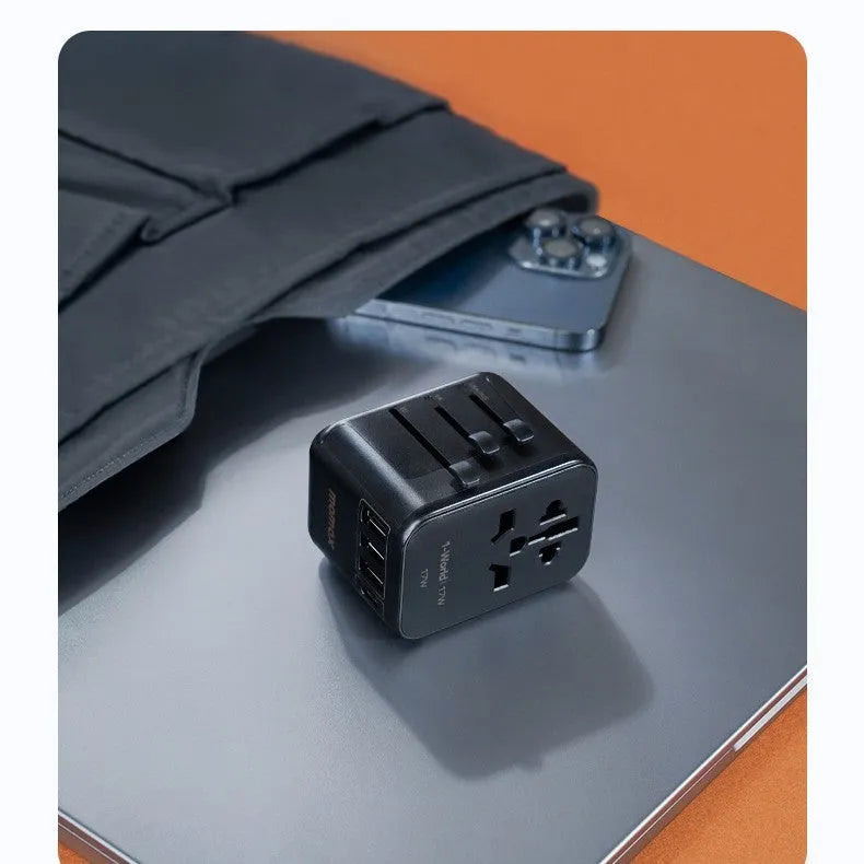 Universal travel adapter UA12 with 4 outlets and USB ports, black, 70x64x48mm