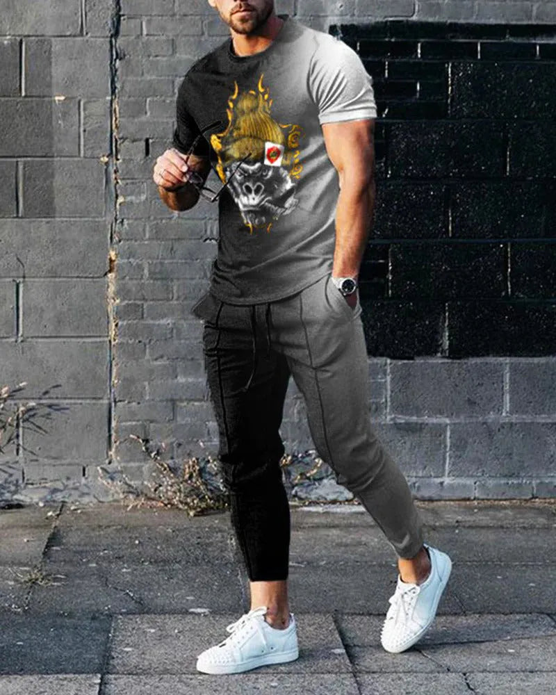 Man wearing a short-sleeved printed round neck T-shirt and matching trousers from a cotton-like polyester suit.