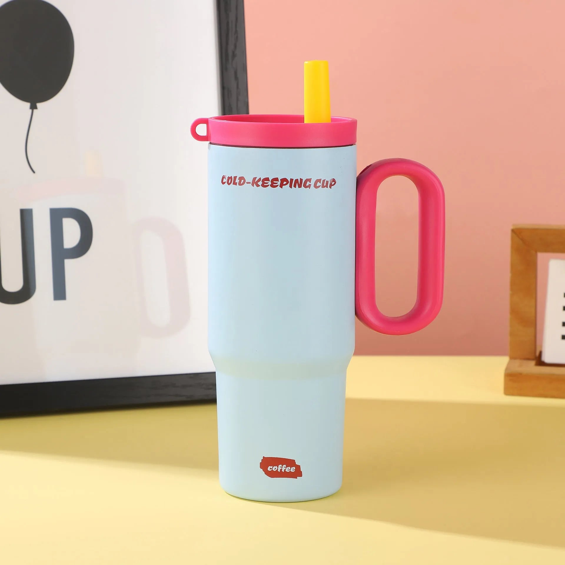 Large insulated portable straw cup with carry handle and straw in multiple colour options.