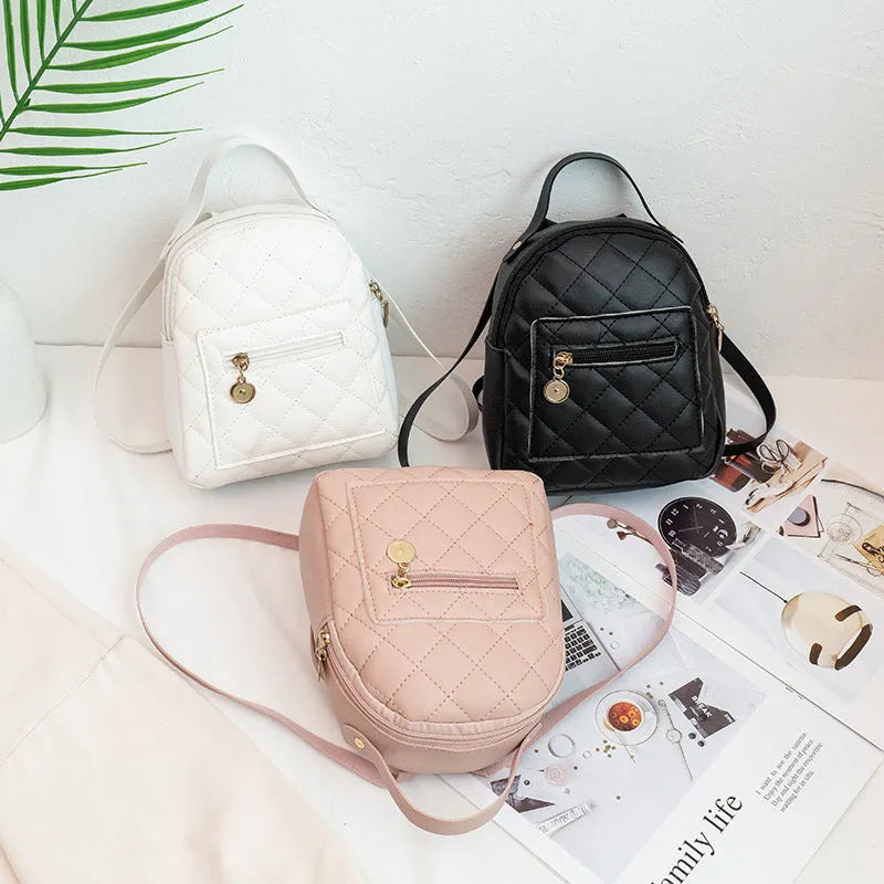 Hard Korean-style backpack with embroidery detail measuring 16x7x19cm in pink colour