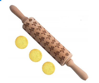 Personalized Christmas rolling pin with a variety of embossed holiday designs, including snowflakes, reindeer, and Merry Christmas patterns