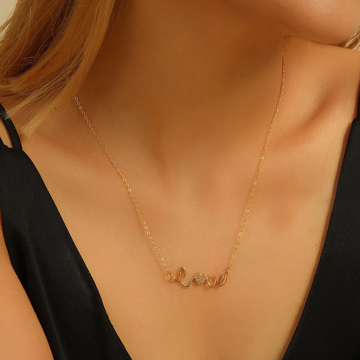 Gold plated copper infinity symbol pendant necklace with sparkling diamond inlay and gold fine chain