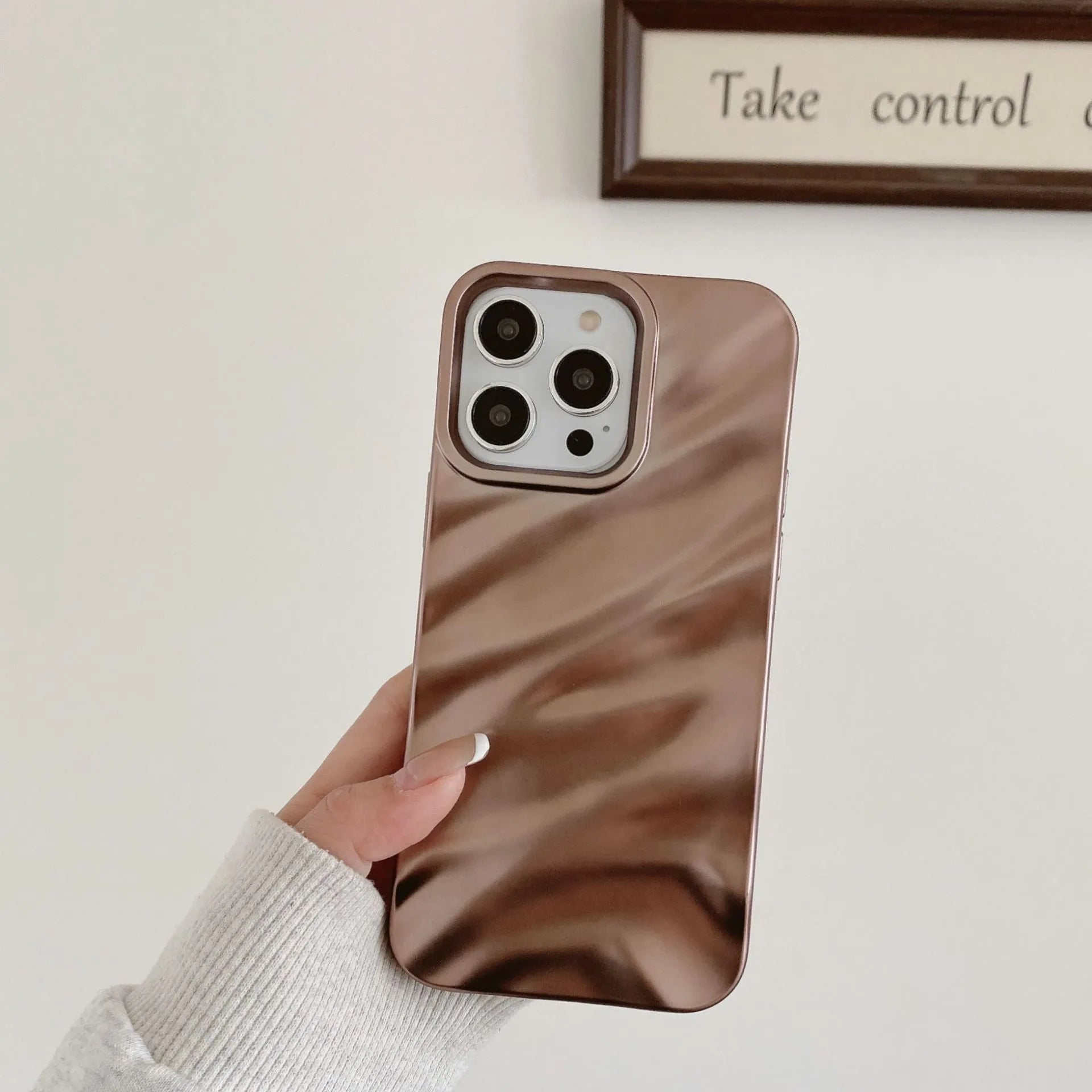 Wave patterned soft TPU phone case for Apple iPhone in burgundy colour showing anti-fall design.