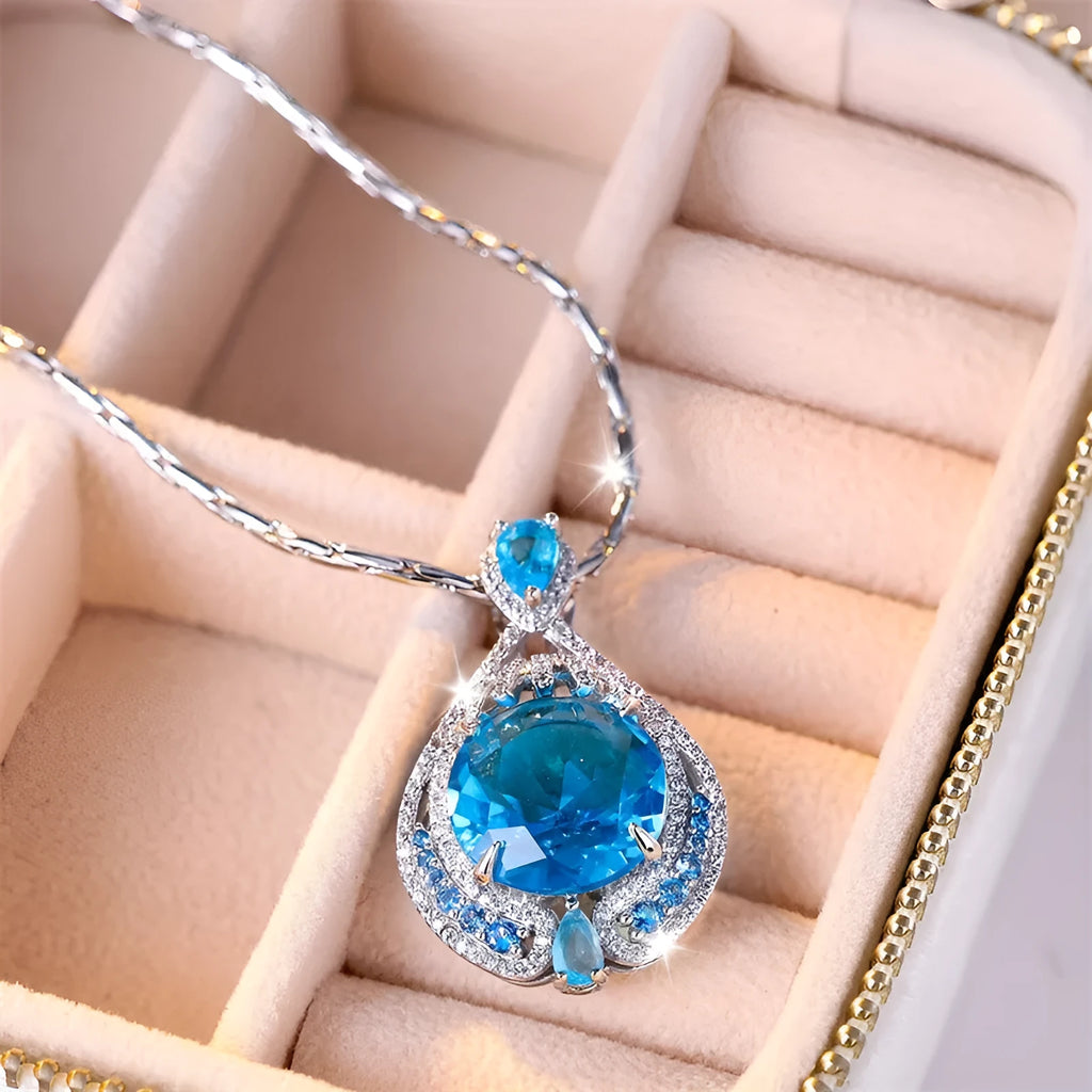 Blue crystal geometric-cut fireworks pendant necklace on water wave chain for women