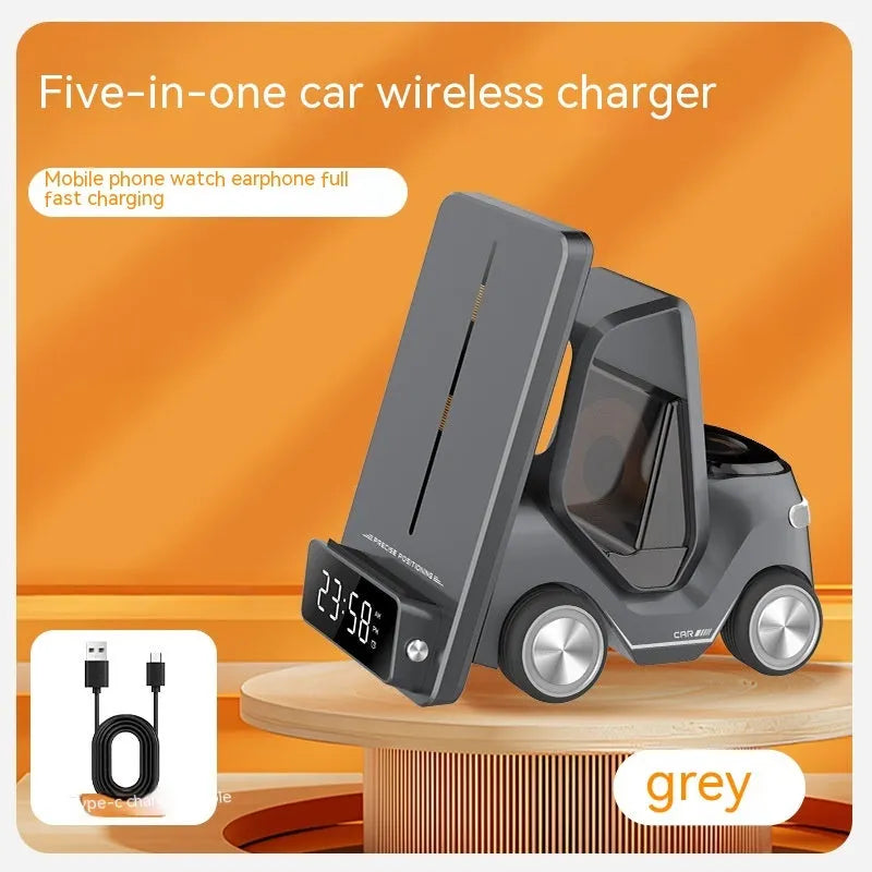 Grey 15W wireless charging bracket holding a phone and two other devices on a desk.