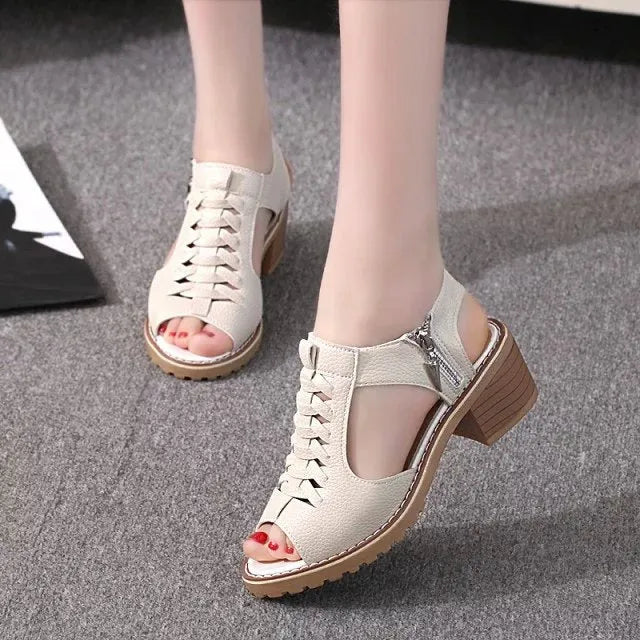 Retro-style women's sandals with side zipper and middle heel in black, white, and creamywhite colours.