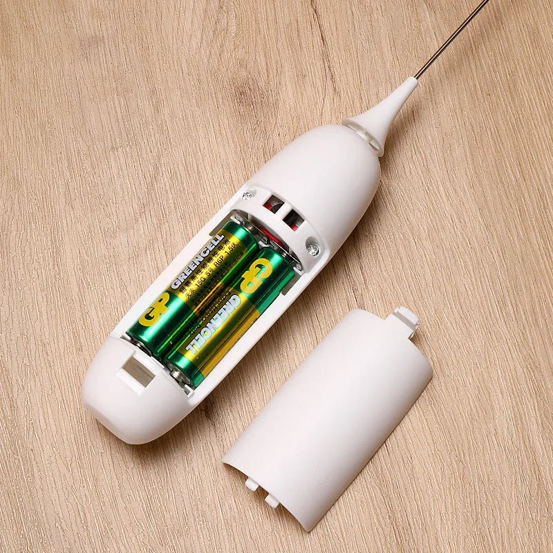 Hand-held electric milk frother and blender in black and white colour options on a kitchen counter.