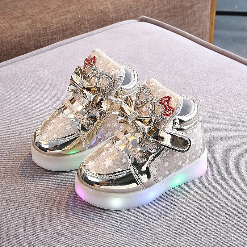 Children's LED light up shoes with button activation in golden, pink, or silvery colours