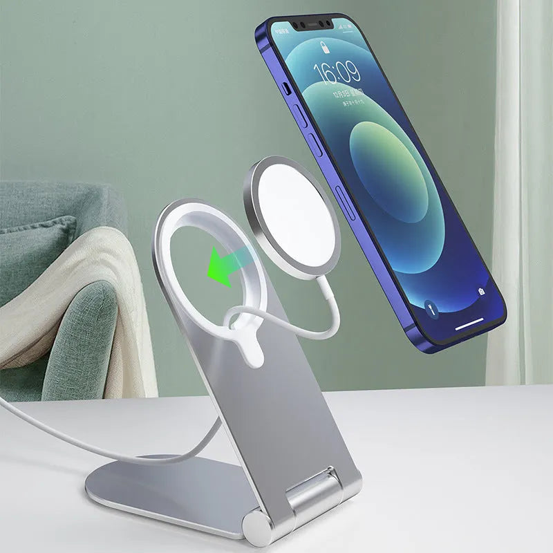 Silver aluminium alloy magnetic bracket holder for iPhone 12 smartphones showing adjustable vertical mounting design