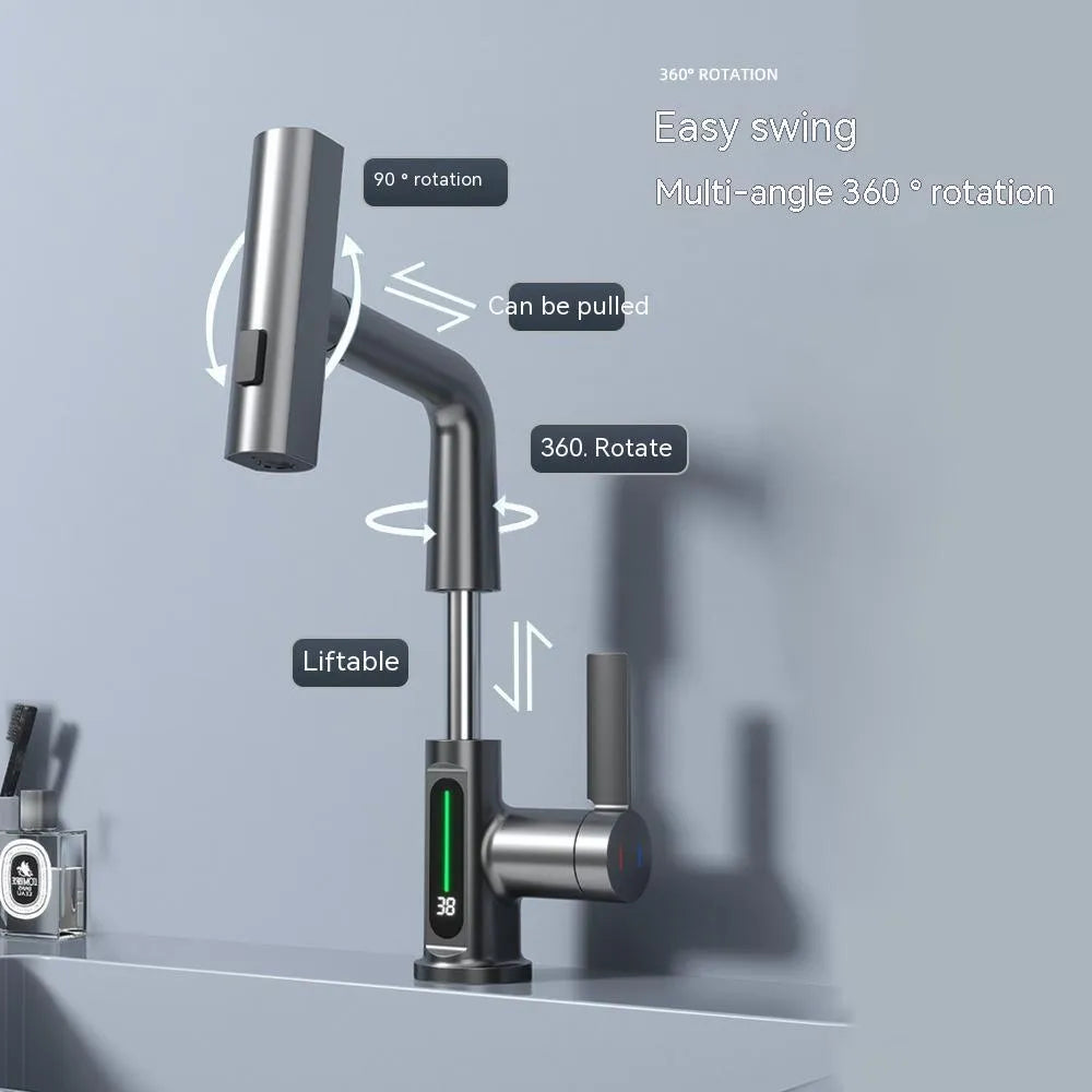 Digital display kitchen tap with pull-out spray hose showing temperature readout