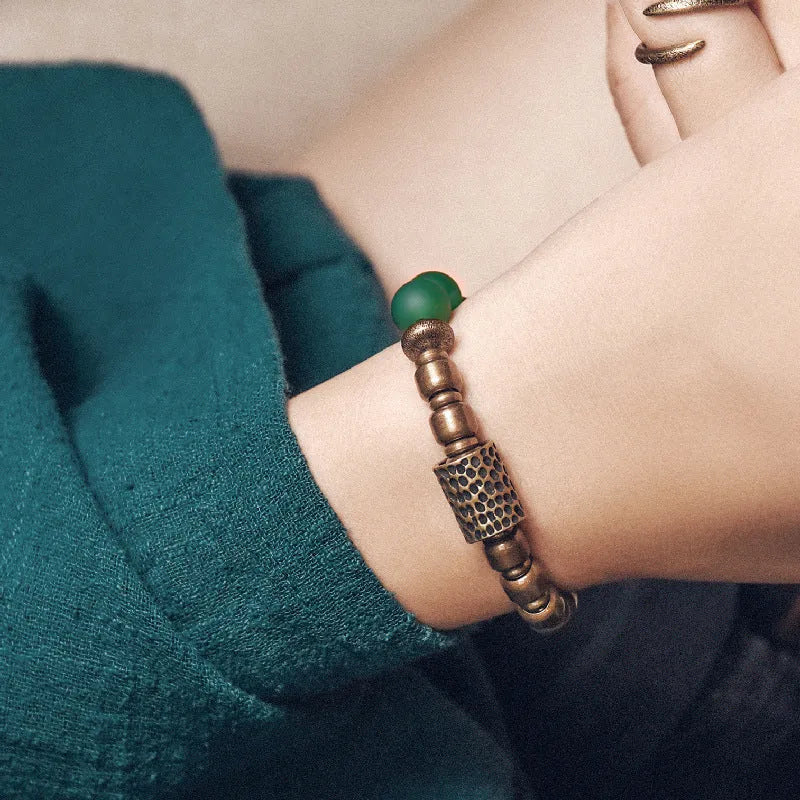 Ethnic couples bracelet with antique-finished green agate beads on natural cord.