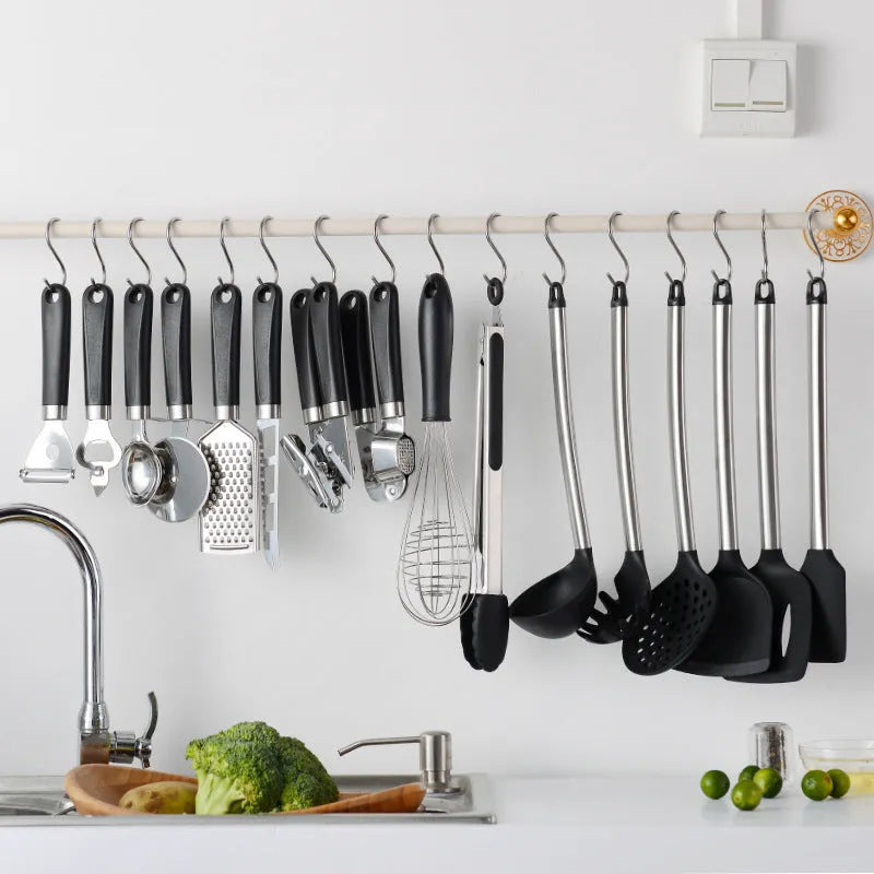 Black silicone spatula and spoon set with stainless steel handles - 16-piece kitchen utensil collection