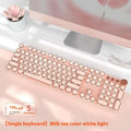 Matcha green 87-key mechanical gaming keyboard with aluminium frame and white backlighting on a desk.