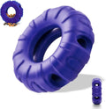 Blue tire-shaped dog chew toy with six oval openings for treat dispensing